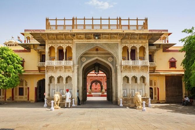 Jaipur Full Day City Tour visit Hawa Mahal, Amber Fort & City Palace - Stop 1: Hawa Mahal Palace of the Winds for Photos and First Impressions