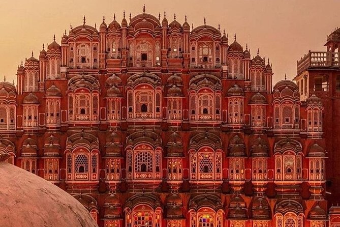Magical Jaipur Night Tour Including Patrika Gate - Statue Circle: a calm plaza pause with a big-photo center