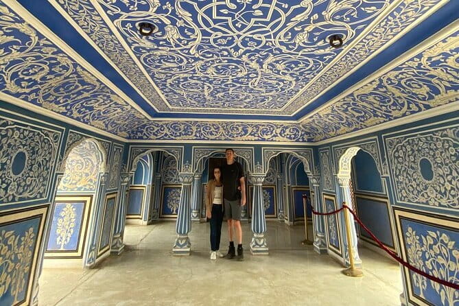 Private Guided City Tour of Jaipur - Jagat Shiromani Ji Temple: a white-marble entry gate and local atmosphere